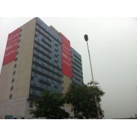 北京供应墙体大型防风广告条幅加工的厂家
